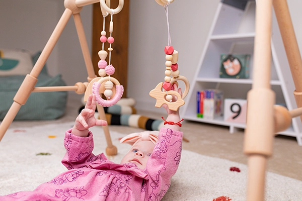 Pałąk dla niemowląt POMPOM